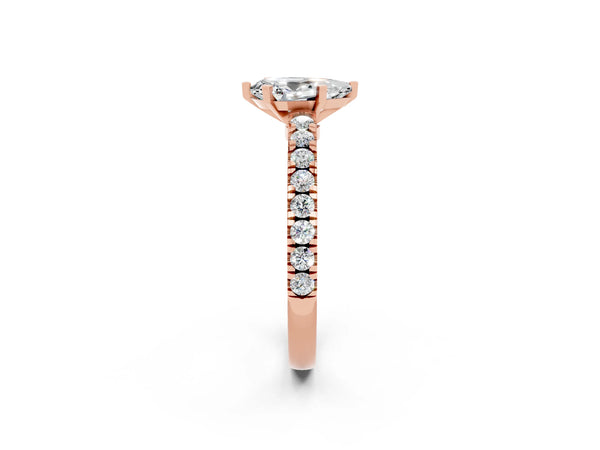 Rose gold Pear Cut Solitaire Moissanite with Pavé Band and Four-Prong Setting