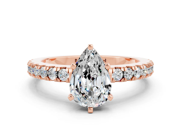 Rose gold Pear Cut Solitaire Moissanite with Pavé Band and Four-Prong Setting
