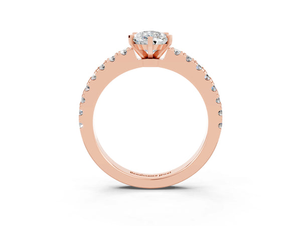 Rose gold Pear Cut Solitaire Moissanite with Pavé Band and Four-Prong Setting