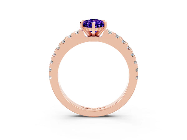 Rose gold Pear Cut Solitaire Tanzanite with Pavé Band and Four-Prong Setting