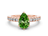 Rose gold Pear Cut Solitaire Diamond with Pavé Band and Four-Prong Setting