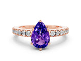 Rose gold Pear Cut Solitaire Diamond with Pavé Band and Four-Prong Setting