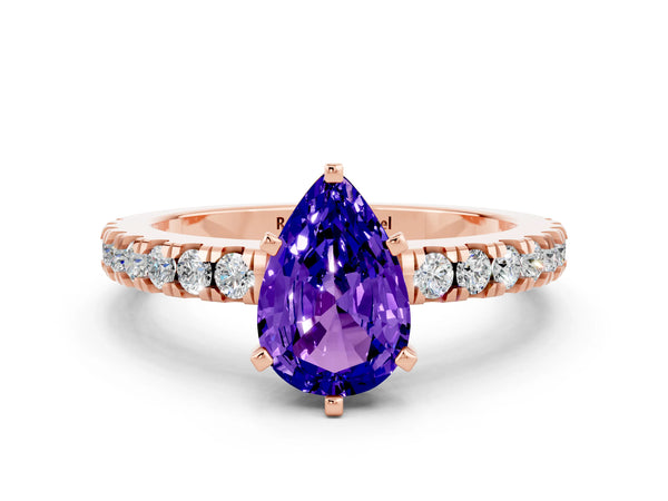 Rose gold Pear Cut Solitaire Tanzanite with Pavé Band and Four-Prong Setting