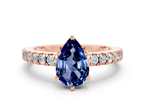 Rose gold Pear Cut Solitaire Diamond with Pavé Band and Four-Prong Setting