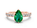 Rose gold Pear Cut Solitaire Diamond with Pavé Band and Four-Prong Setting