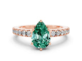 Rose gold Pear Cut Solitaire Diamond with Pavé Band and Four-Prong Setting