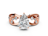 Rose gold Pear Cut Solitaire Diamond with Side Stones on Criss-Cross Band and Four-Prong Setting_25