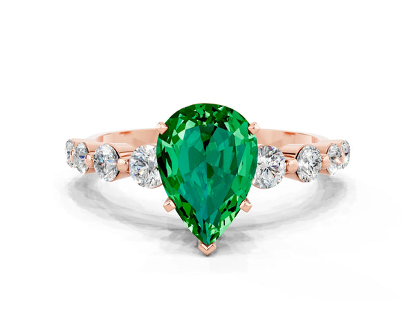 Rose gold Pear Cut Solitaire Emerald Ring with Pave Band and Four-Prong Setting