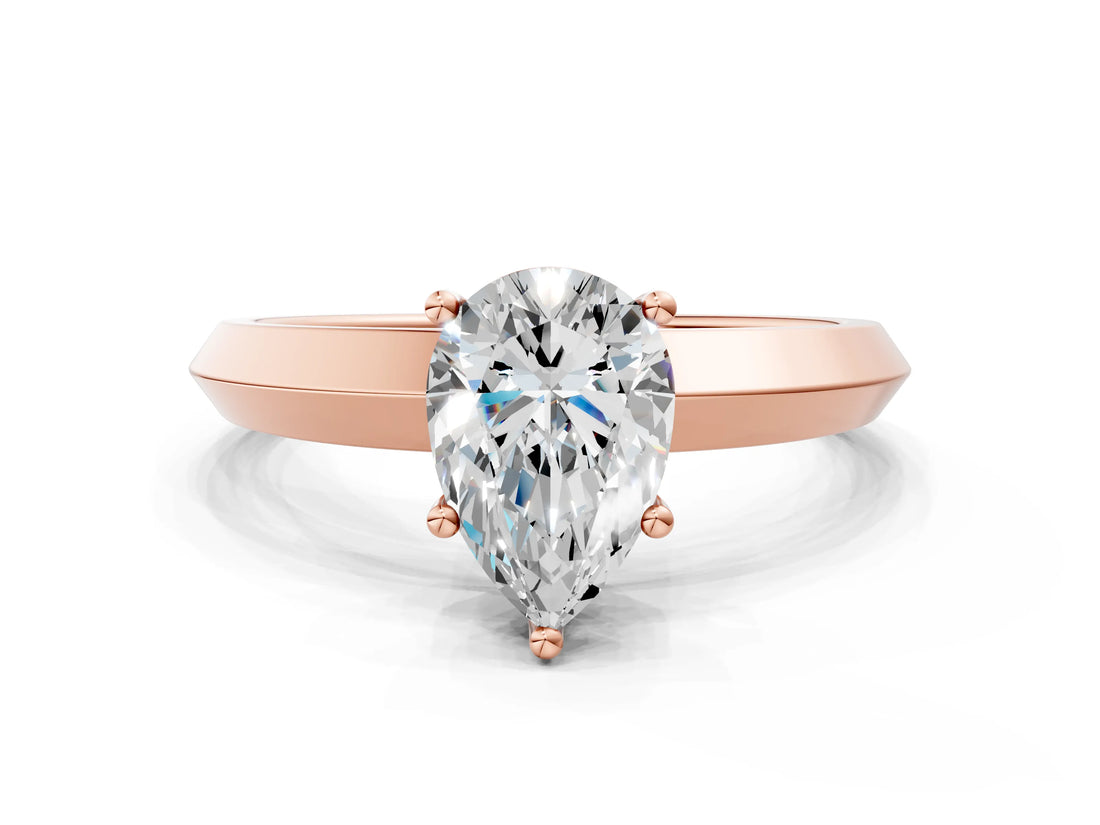 Rose gold Pear Cut Solitaire Engagement Ring with Flat Band and Four-Prong Setting