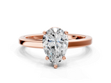 Rose gold Pear Cut Solitaire Engagement Ring with Four-Prong Setting on a Classic Band_37