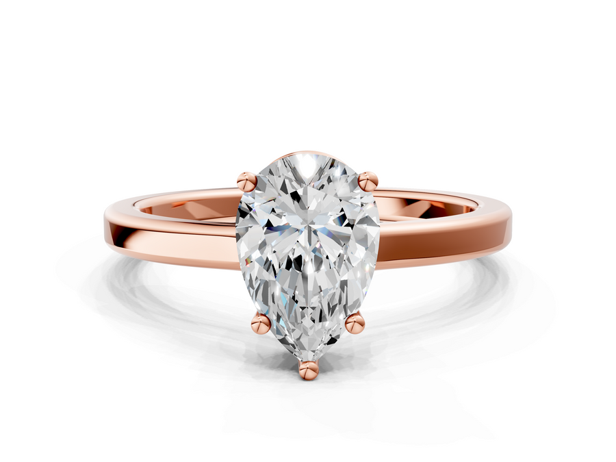 Rose gold Pear Cut Solitaire Engagement Ring with Four-Prong Setting on a Classic Band