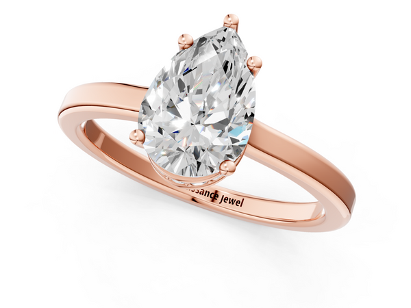 Rose gold Pear Cut Solitaire Engagement Ring with Four-Prong Setting on a Classic Band