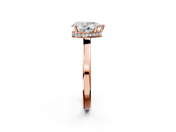 Rose gold Pear Cut Solitaire Engagement Ring with Four-Prong Setting on a Classic Band