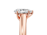 Rose gold Pear Cut Solitaire Engagement Ring with Tapered Band and Four-Prong Setting_8