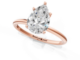 Rose gold Pear Cut Solitaire Engagement Ring with Thin Band and Four-Prong Setting_4