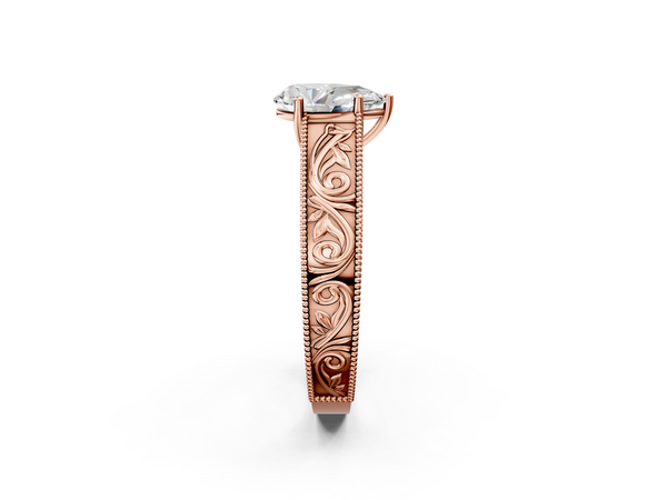 Rose gold Pear Cut Diamond Solitaire Ring with Engraved Band and Four-Prong Setting