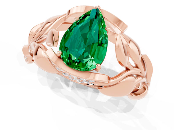 Rose gold Pear Cut Emerald Leaf-Inspired Engagement Ring with Round Accents and Prong Setting