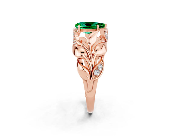 Rose gold Pear Cut Emerald Leaf-Inspired Engagement Ring with Round Accents and Prong Setting