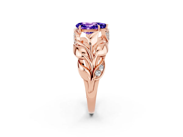 Rose gold Pear Cut Tanzanite Leaf-Inspired Engagement Ring with Round Accents and Prong Setting