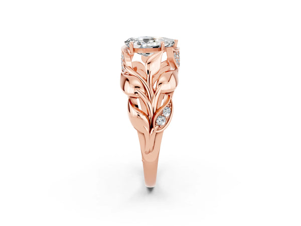 Rose gold Pear Cut Moissanite Leaf-Inspired Engagement Ring with Round Accents and Prong Setting