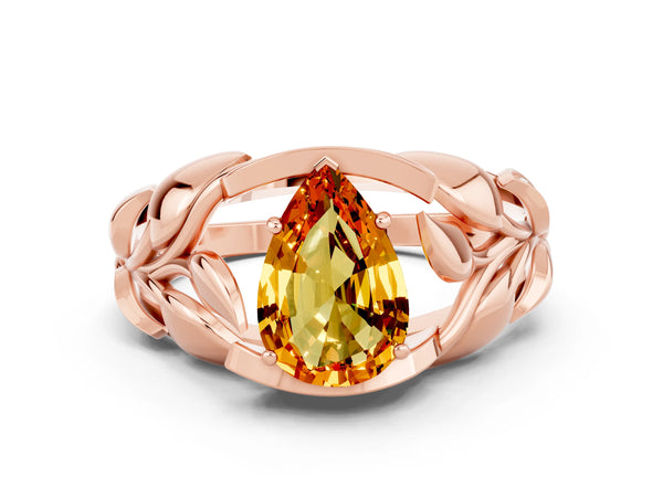 Rose gold Pear Cut Citrine Leaf-Inspired Engagement Ring with Round Accents and Prong Setting