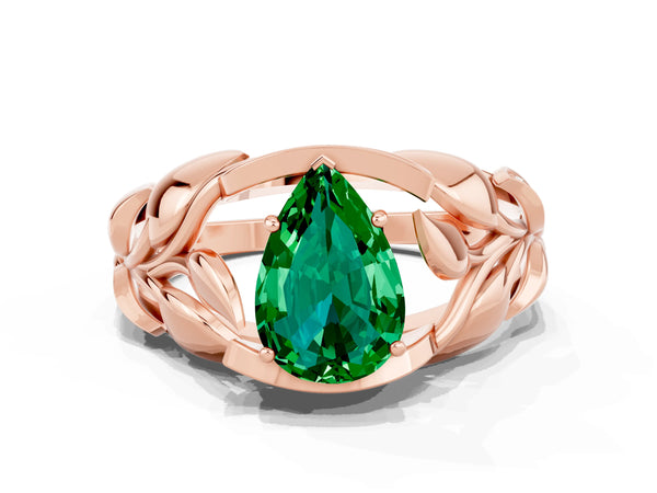 Rose gold Pear Cut Emerald Leaf-Inspired Engagement Ring with Round Accents and Prong Setting