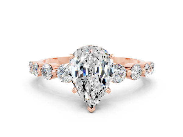 Rose gold Pear Cut Solitaire Moissanite Ring with Pave Band and Four-Prong Setting