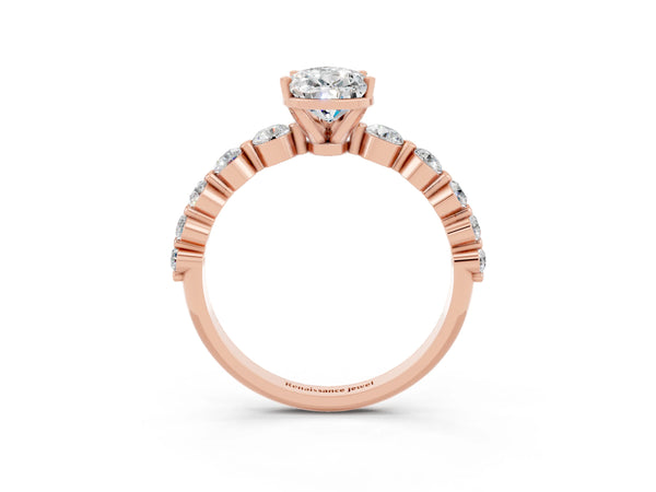 Rose gold Pear Cut Solitaire Moissanite Ring with Pave Band and Four-Prong Setting