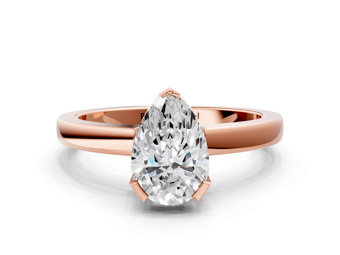 Rose gold Pear Cut Solitaire Ring with Four-Prong Setting and Classic Band_57