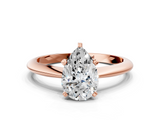Rose gold Pear Cut Solitaire Ring with Four-Prong Setting on a Classic Band_73