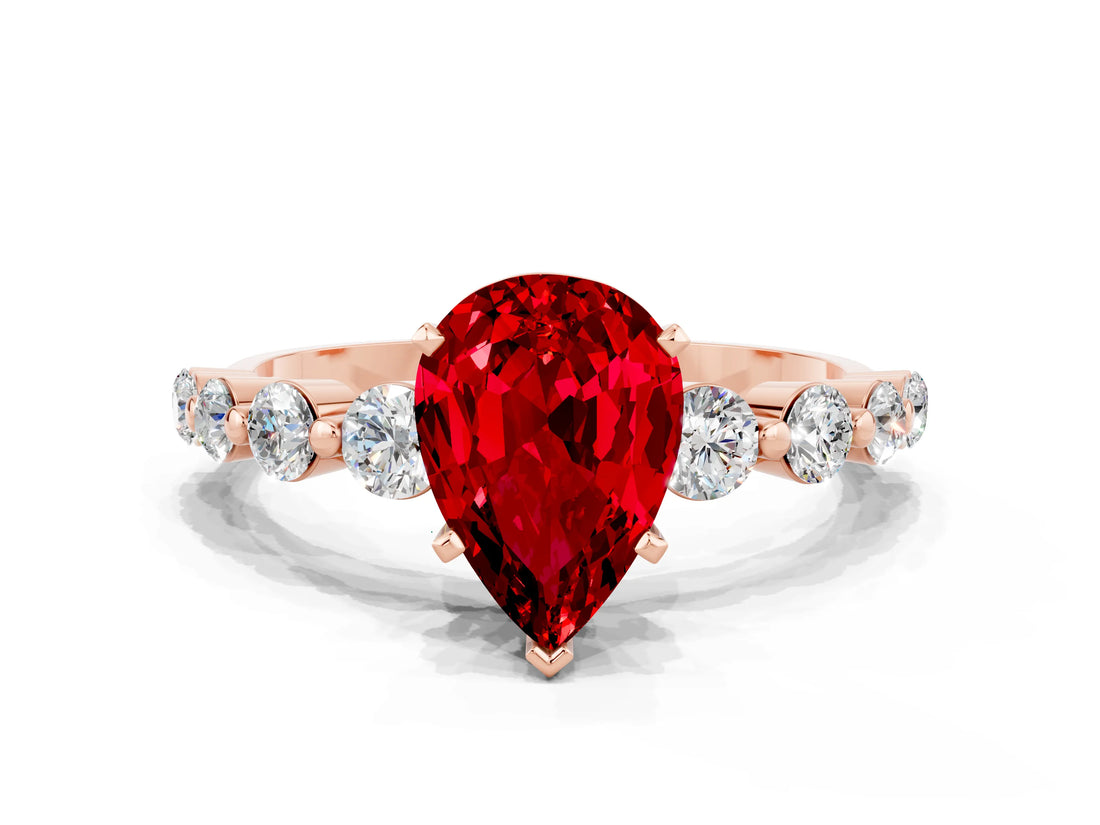 Rose gold Pear Cut Solitaire Ruby Ring with Pave Band and Four-Prong Setting