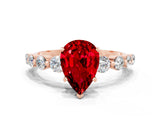 Rose gold Pear Cut Solitaire Ruby Ring with Pave Band and Four-Prong Setting