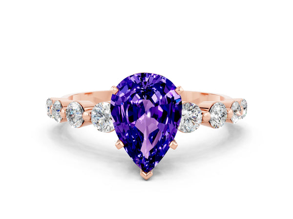 Rose gold Pear Cut Solitaire Tanzanite Ring with Pave Band and Four-Prong Setting
