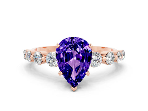 Rose gold Pear Cut Solitaire Tanzanite Ring with Pave Band and Four-Prong Setting