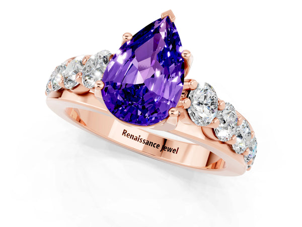 Rose gold Pear Cut Tanzanite Engagement Ring with Pavé Band and Four-Prong Setting