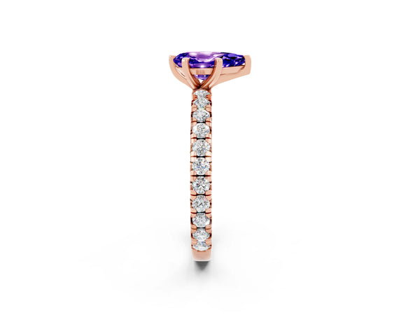 Rose gold Pear Cut Tanzanite Pavé Solitaire Ring with Round Band and Prong Setting