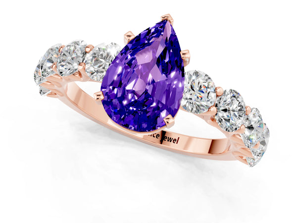 Rose gold Pear Cut Tanzanite Prong Setting with Side Stones on a Pave Band