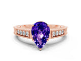 Rose gold Pear Cut Tanzanite Ring with Milgrain Pavé Band and Four-Prong Setting_12