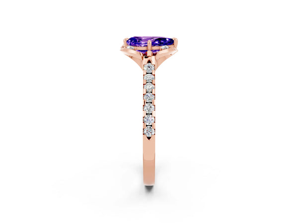 Rose gold Pear Cut Tanzanite Ring with Pavé Band and Floral Prong Setting