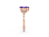 Rose gold Pear Cut Tanzanite Ring with Side Stones and Four-Prong Setting_38