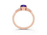 Rose gold Pear Cut Tanzanite Ring with Side Stones and Four-Prong Setting_39