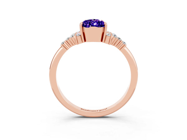 Rose gold Pear Cut Tanzanite Ring with Side Stones and Four-Prong Setting