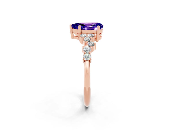 Rose gold Pear Cut Tanzanite Scattered Round Accent Ring with Prong Setting