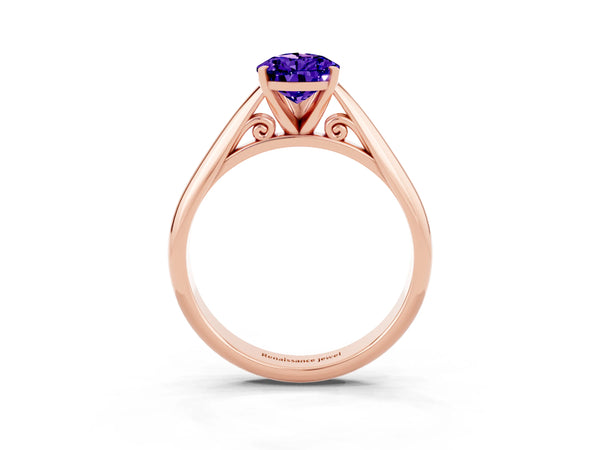 Rose gold Pear Cut Tanzanite Solitaire Engagement Ring with Cathedral Setting and Four-Prong Mount
