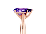 Rose gold Pear Cut Tanzanite Solitaire Engagement Ring with Cathedral Setting and Four-Prong Mount_23
