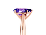 Rose gold Pear Cut Tanzanite Solitaire Engagement Ring with Cathedral Setting and Four-Prong Mount_29