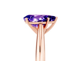 Rose gold Pear Cut Tanzanite Solitaire Engagement Ring with Cathedral Setting and Four-Prong Mount_83