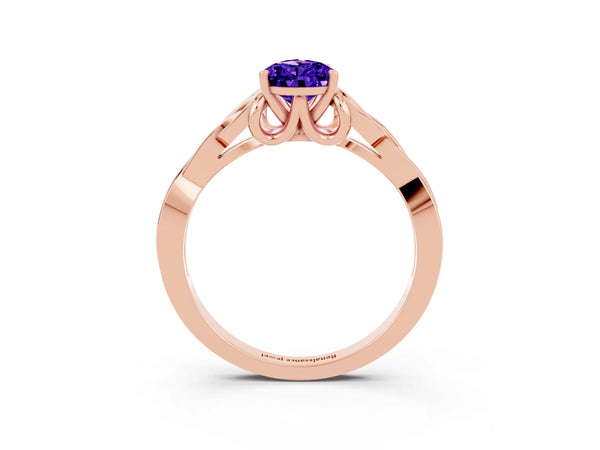 Rose gold Pear Cut Tanzanite Solitaire Engagement Ring with Celtic Knot Band and Four-Prong Setting