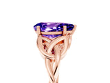 Rose gold Pear Cut Tanzanite Solitaire Engagement Ring with Celtic Knot Band and Four-Prong Setting_5