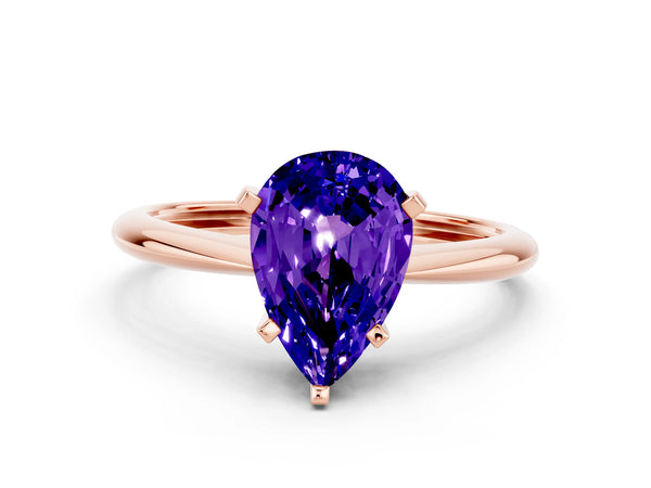 Rose gold Pear Cut Tanzanite Solitaire Engagement Ring with Classic Band and Four-Prong Setting